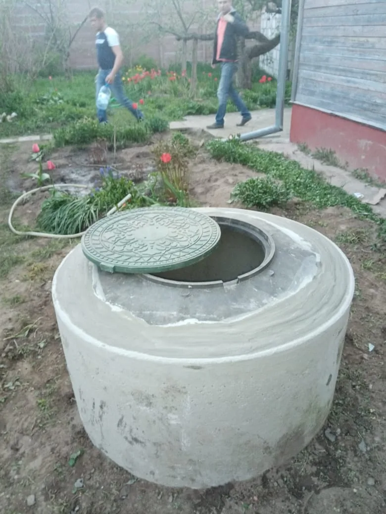 Домик на колодце